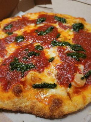 10" Boomer Special. Mozzarella, provolone, parmigiano, ricotta, basil pesto, piquant tomato sauce on top. Thin crisp crust.  $13.95.