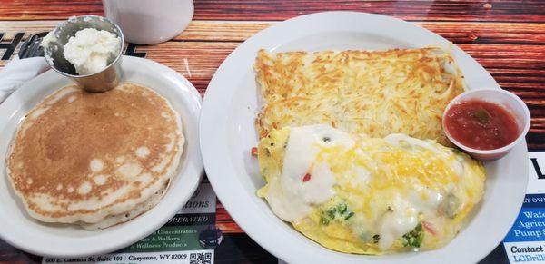 Veggie omelet with cheeses, salsa, hash browns, pancake and coffee