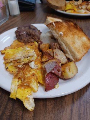 Eggs, potatoes, sausage, toast