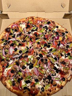 New York Special Pizza. Extra large with pepperoni, sausage, red onion, mushroom, olives, and green bell peppers. Must try.