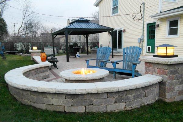 Unilock Dimensional & Ledgestone Seating Wall. Paver patio, gazebo, firepit install in Palatine.