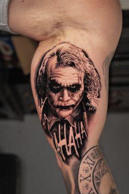 Black and grey realism of joker tattoo