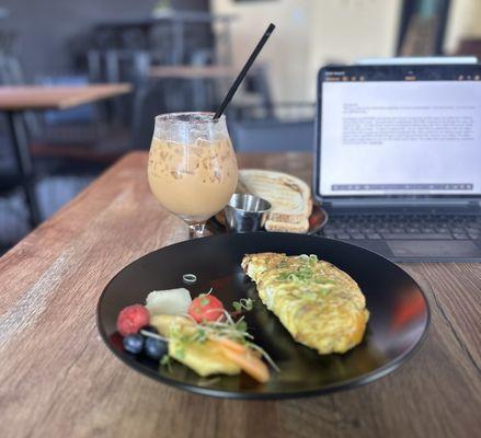 Iced latte and bacon cheddar omelette