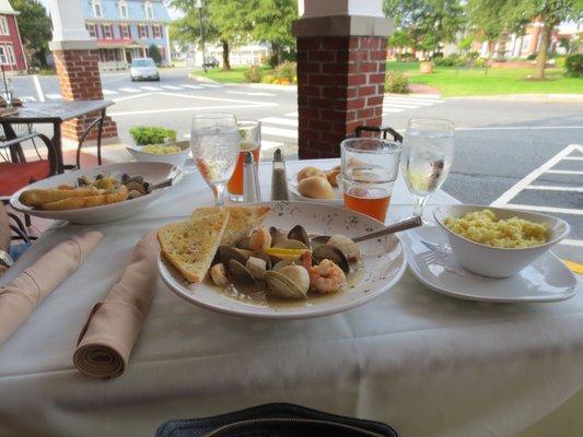 Seafood bouillabaisse and saffron risotto served on the front porch.