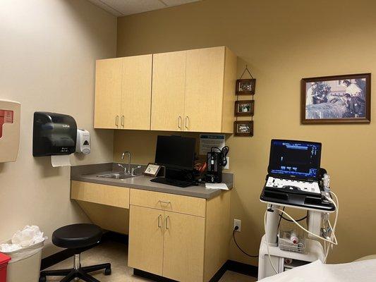 One of the exam rooms with ultra sound machine.