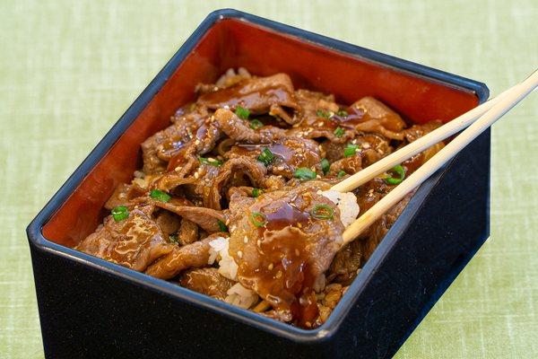 "Wagyu" Grilled Beef over rice.
 Come to try our most popular dish!