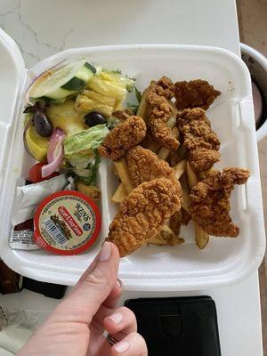 Chicken finger dinner. these chicken tenders were so small. little scrap pieces with this sad little salad.