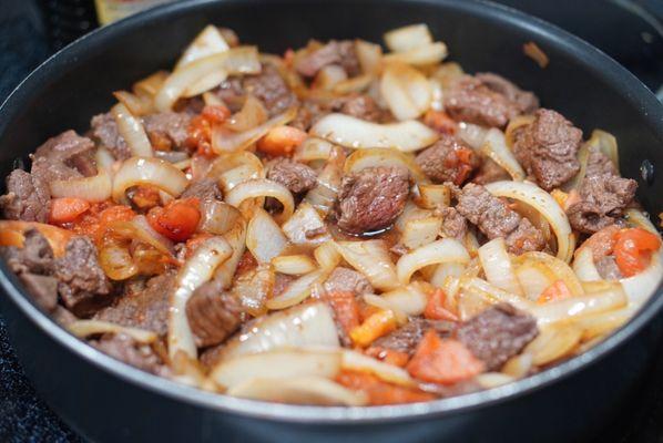 Chuck steak with onions and tomato (bought the CHUCK Steak meat fR. Costco) *1/14/24