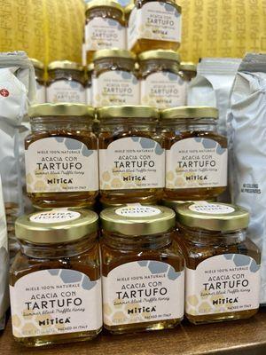 Truffle honey. Trying this brand. Love truffle honey with a thin slice of pear and brie. Oh yes!