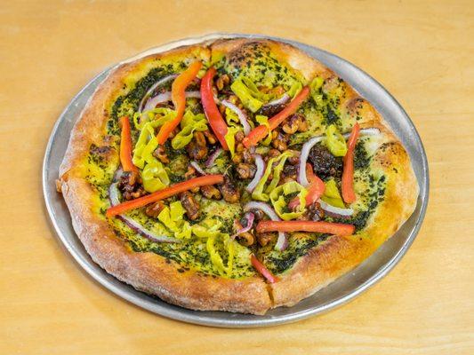 The Barndon comes with pesto, red onion, red bell pepper, pepperoncini, and spiced walnuts