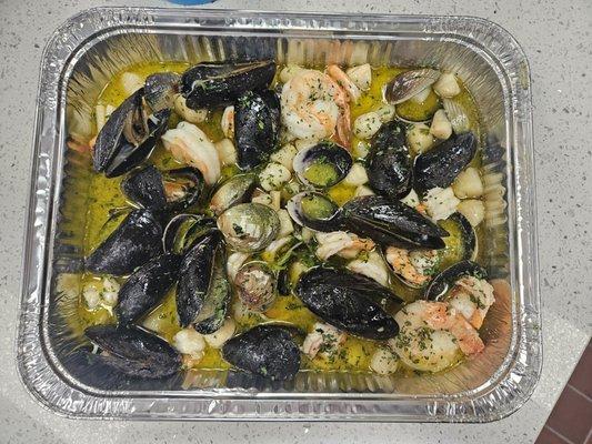 Seafood in green sauce served w/ rice