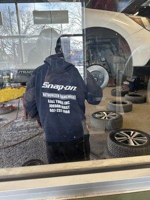 This is Chris working on my brakes needed all four discs replaced.