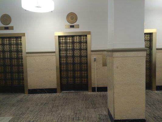 Lobby elevators - take up to 6th floor for Hamilton Housing Solutions Offices