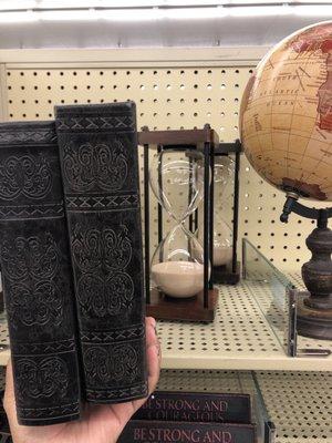 Fake books!  Globes and an hour glass.