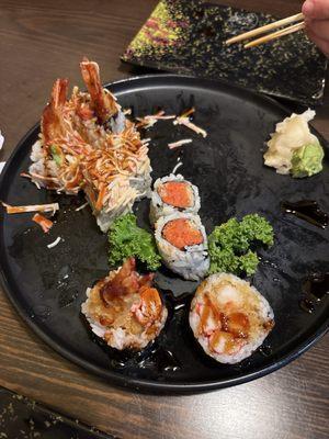 The end of a Spicy Crunchy Tuna roll, Angry Dragon Roll, Tempura Crab Meat Roll.