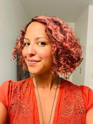 Curly haircut pink coloring