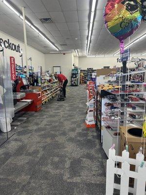 Huge clean store and this guy was vacuuming!