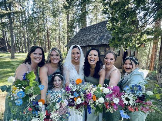 Brittany with her bridal party and flowers from our Bulk Bloom Buckets.