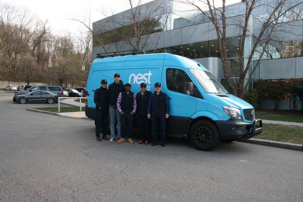 Our NY crew in front of our Nest Van, awarded to us by Google for excellent customer service.