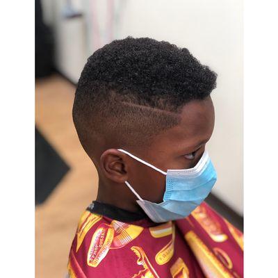 Mid bald fade with razor line - done by Emilee