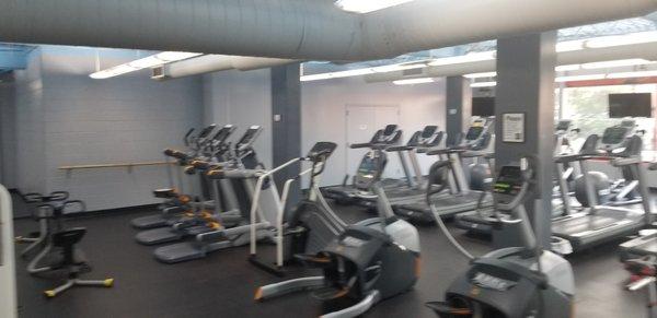 The fitness center features cardio and weight equipment.