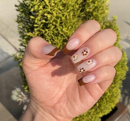 nails, french tip, floral design, warm brown tones