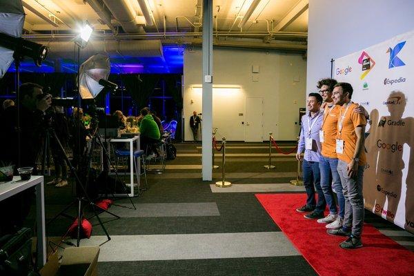 Attendees enjoying the step and repeat