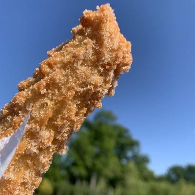 Warm and crisp cinnamon and sugar churro ($3)