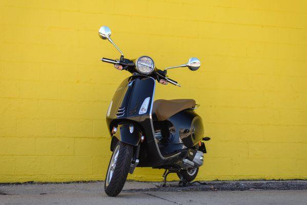 Vespa Primavera 150 scooter in black.