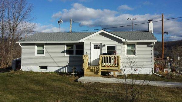 New Roof, Gutters, Windows, and Door