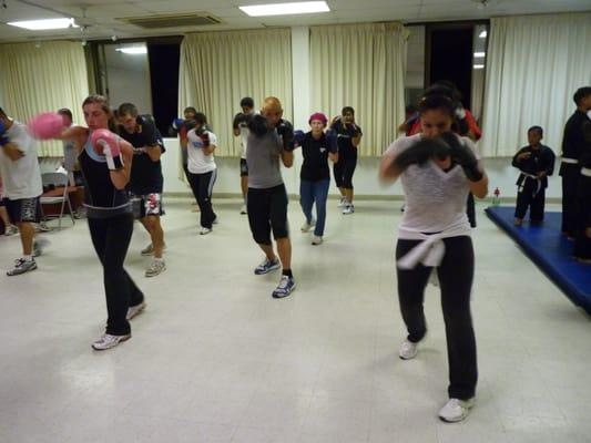 Cardio- fitness with dynamic boxing, kicking techniques, full core workouts, lot's of sweat. Well respected trainers.