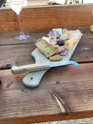 Cheese and charcuterie board and gustav Lorentz sparkling wine