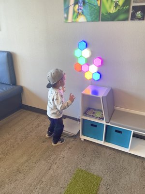 My son playing in the waiting area AFTER his appointment. He didn't want to leave