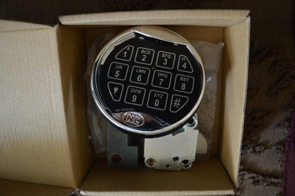 This is the cheap plastic replacement sent. The keypad is adhered crooked so you can see inside!!