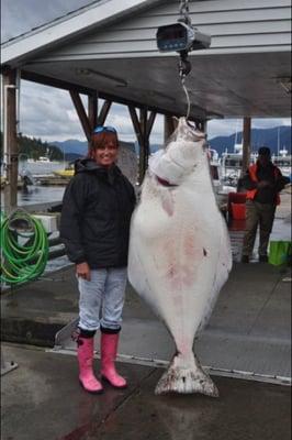 Hallie (Fishin' Chix) showing how it is done.,,when out fishing on the Empty Pocket with Capt. Jerry.