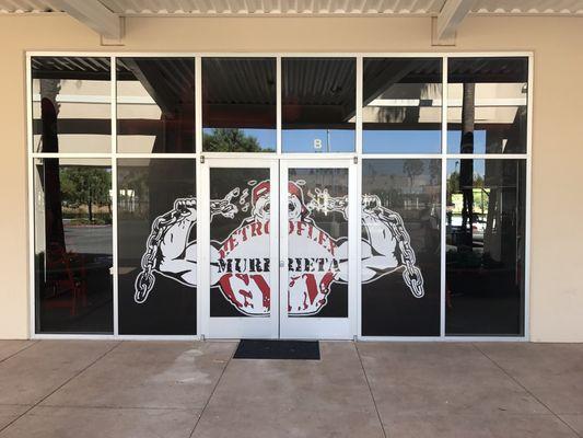 Perforated window vinyl for a local gym.