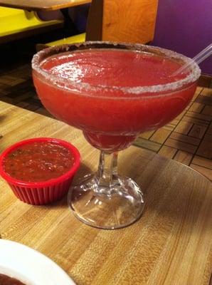 Strawberry margarita with sugar on the rim