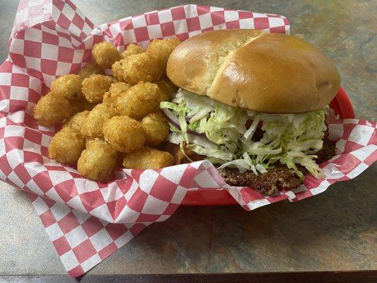 Single Squish burger with everything, bacon, cheese with tots.