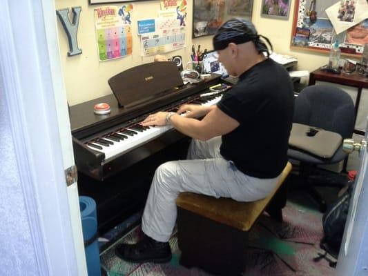 Our piano teacher Roby Deaton