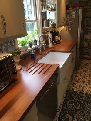 Perfectly installed cabinets in an old crooked house.