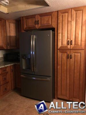 Coffee Raised Panel Cabinets with New Venetian Gold Granite