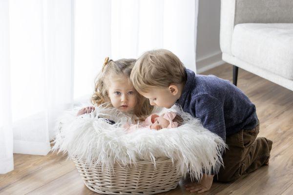 Newborn session with family in the studio with window light is easy and beautiful!