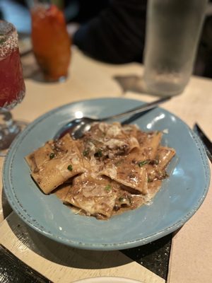 Oversized rigatoni, braised porcini 'cacio e pepe,' white truffle butter, Asiago