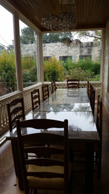 Inside dining table with a beautiful view of the pond