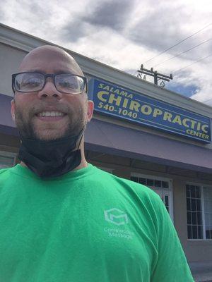 Nicholas Williams in front of office. Correlations Massage is inside of Salama Chiropractic.