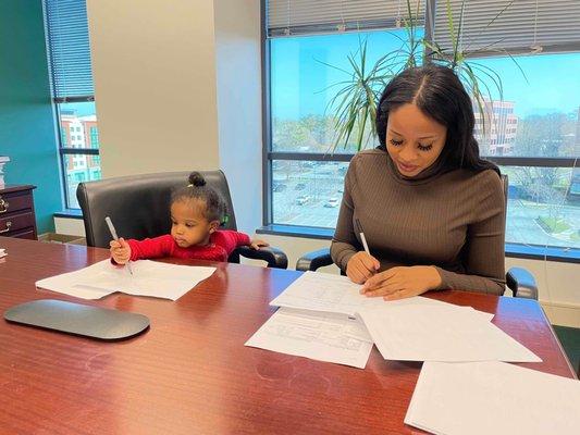 Me and my daughter signing for our first home! Thanks Alison!