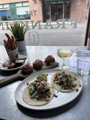 Fish tacos, crab cakes, and fries.