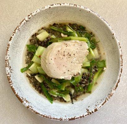 Hainanese Style Chicken in a rich ginger chicken broth, scallions, bokchoy, wild rice & quinoa pilaf.