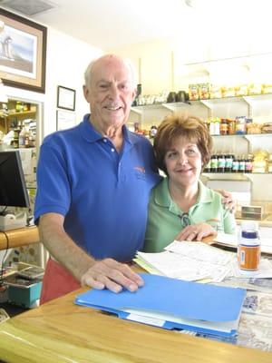 The owner in ORANGE & BLUE (GO GATORS!) with Lisa the "President"