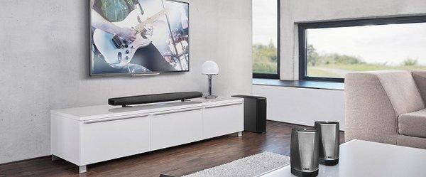 Denon-Heos wireless soundbar and subwoofer.  Perfect sound, uncluttered for any television.